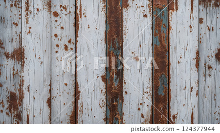 White and brown painted weathered wooden boards showing signs of age and wear White and brown painted weathered wooden boards showing signs of age and wear 124377944