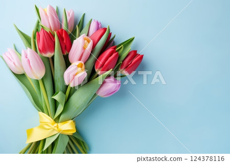 Beautiful Bouquet of Tulips on Blue Background Banner Beautiful Bouquet of Tulips on Blue Background Banner 124378116