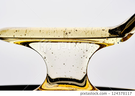 Photo of a sugar paste for depilation hair removal procedure. Texture. 124378117