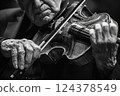 Musician playing violin in black and white photo, Classical music entertainment 124378549