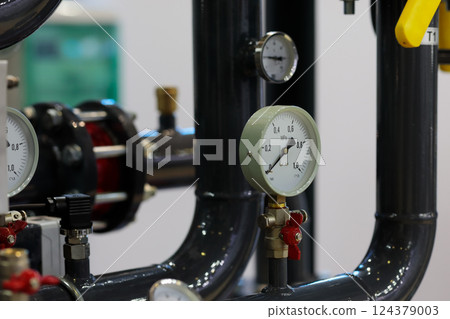 closeup of industrial process piping system 124379003