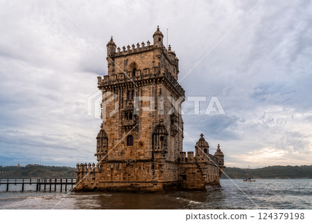 The iconic Belem Tower rises gracefully from the Tagus River, a symbol of Lisbon's history. The iconic Belem Tower rises gracefully from the Tagus River, a symbol of Lisbon's history. 124379198