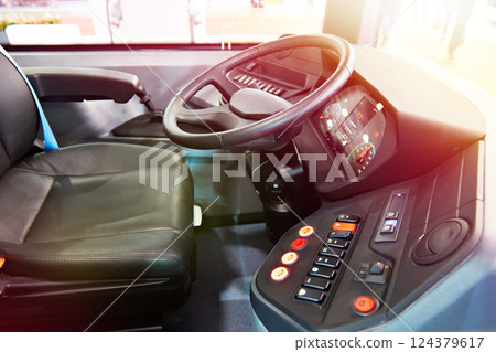 Driver seat and steering wheel with dashboard of bus 124379617