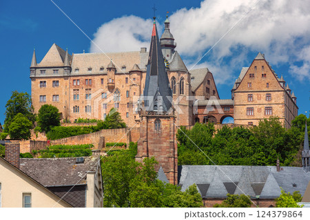 Landgrafenschloss castle in Marburg Germany with fachwerk houses 124379864