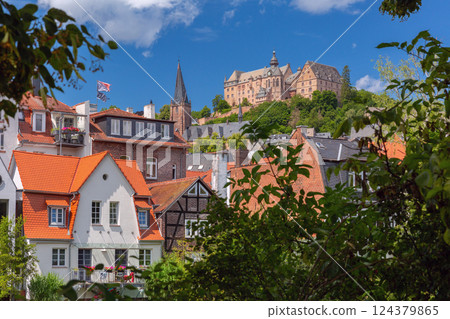 Landgrafenschloss castle in Marburg Germany with fachwerk houses 124379865
