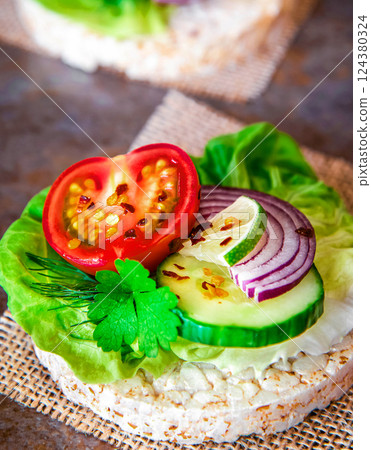 Healthy food - sandwiches, rice cakes with lettuce, tomato, cucumber. Perfect for weight loss diet 124380324