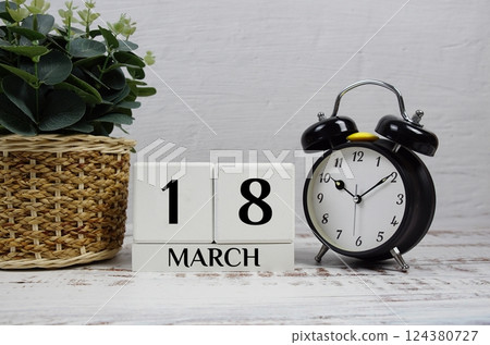 Wooden Calendar Showing the Date of March 18th. Day 18 of March month 124380727