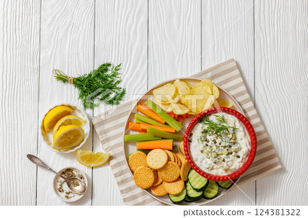 creamy yogurt pickles caper dill dip in red bowl 124381322