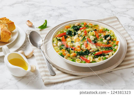 Vegetarian Minestrone with in white bowl, top view 124381323
