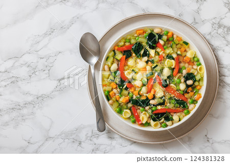 Vegetarian Minestrone with in white bowl, top view 124381328