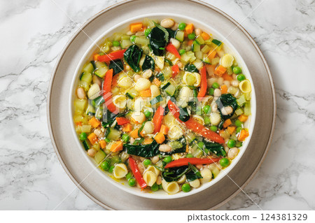Vegetarian Minestrone with in white bowl, top view Vegetarian Minestrone with in white bowl, top view 124381329