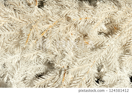 Close-up of White Artificial Pine Branches Close-up of White Artificial Pine Branches 124381412