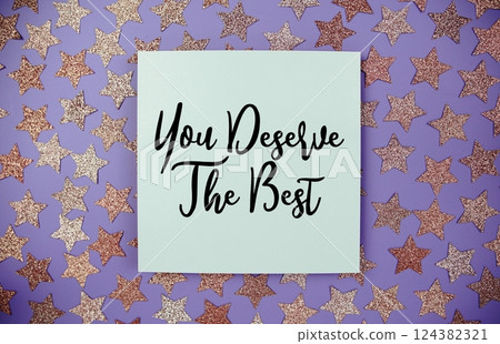You are The Best text  motivational and inspiration quote on paper card with star glitter decoration flat lay on purple background 124382321