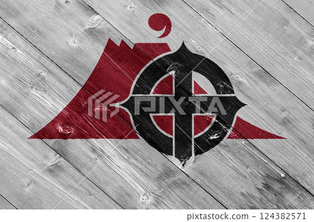 Official flag of Ishikawa. City in Japan. Conceptual collage on wood texture Official flag of Ishikawa. City in Japan. Conceptual collage on wood texture 124382571