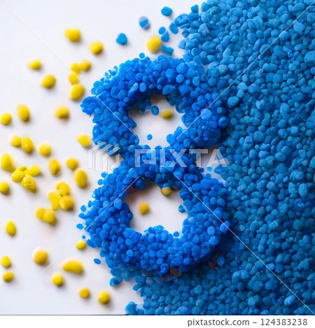 Number 8 made of blue and yellow plastic granules on white background Number 8 made of blue and yellow plastic granules on white background 124383238
