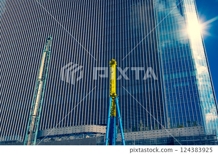 High-rise buildings under construction and sunlight reflections Takanawa Gateway area 2025.03 b-3 Warm and cool colors 124383925