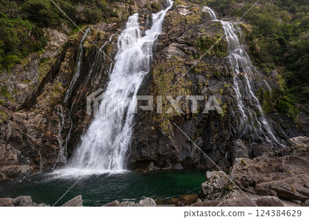 Roaring Okawa Falls, one of Japan's top 100 waterfalls, Yakushima National Park (Spring) 124384629