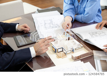 Housing sales meeting scene hands no face Housing sales meeting scene hands no face 124384785