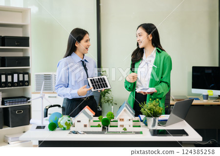 Business team people planning hand using laptop for working technology and business Net zero 124385258