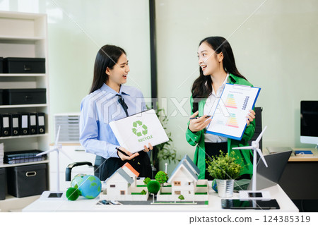 Business team people planning hand using laptop for working technology and business Net zero Business team people planning hand using laptop for working technology and business Net zero 124385319