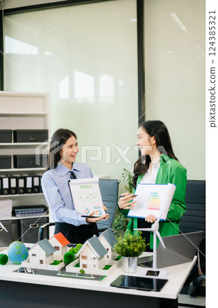 Business team people planning hand using laptop for working technology and business Net zero Business team people planning hand using laptop for working technology and business Net zero 124385321