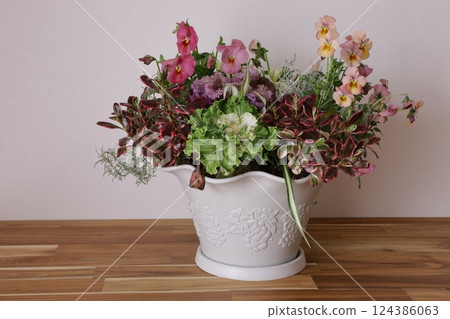 Potted plant with pansies Potted plant with pansies 124386063