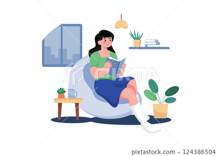 Girl Reading A Book At Home 124386504
