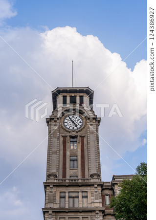 The Bell Tower of Shanghai History Museum under the blue sky and white clouds 124386927