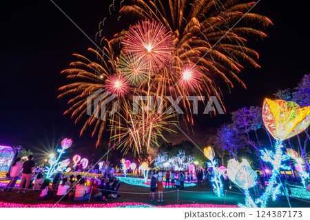 Chiang Mai fireworks display countdown celebration at Chaloem Phrakiat Park, Chiang Mai Province, Thailand. 124387173