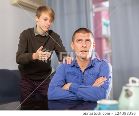 Upset father turned away after quarrel with teenage son 124388356