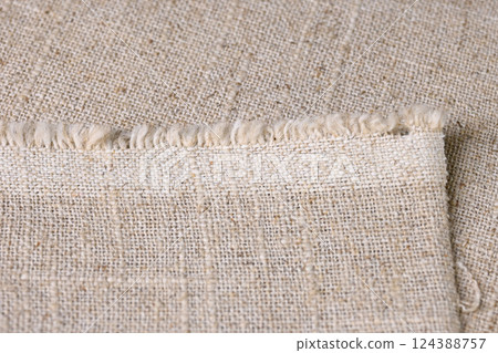 brown hemp viscose natural fabric cloth, sackcloth rough texture of textile fashion 124388757