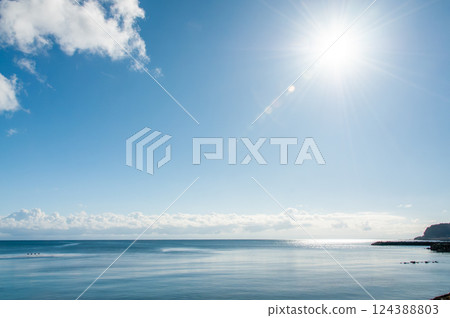 The calm spring sea 124388803