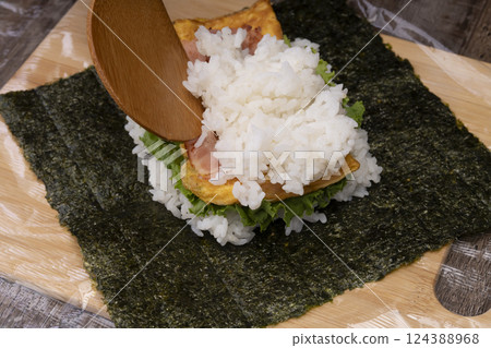 The process of making onigirazu rice balls The process of making onigirazu rice balls 124388968