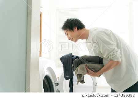 A man who is washing A man who is washing 124389398
