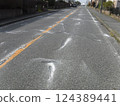 Repairing cracked asphalt roads 124389441