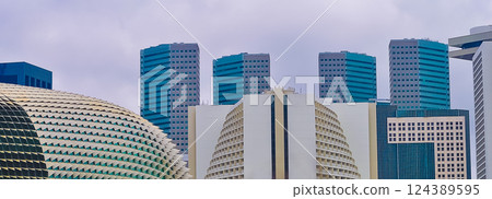 View of modern business skyscrapers glass and sky view landscape of commercial building in central city View of modern business skyscrapers glass and sky view landscape of commercial building in central city 124389595