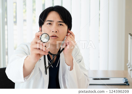Doctor who places a stethoscope 124390209