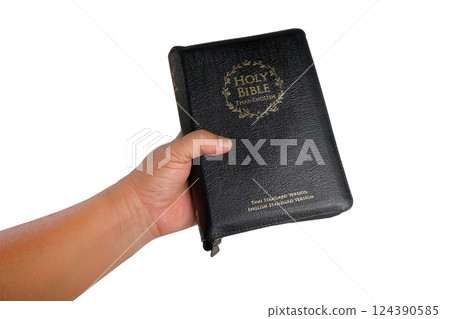 Books of the Bible in hand on white.clipping path. Books of the Bible in hand on white.clipping path. 124390585