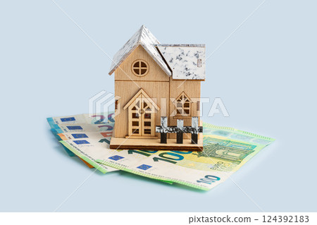 Wooden house and money 124392183