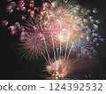 Fireworks dancing in the night sky 124392532