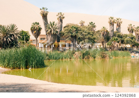 Ica Region, Peru - dec 2, 2024 Oasis- Huacachina, a village in southwestern Peru.  124392868