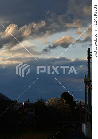 Sunset hidden in the clouds 124393232