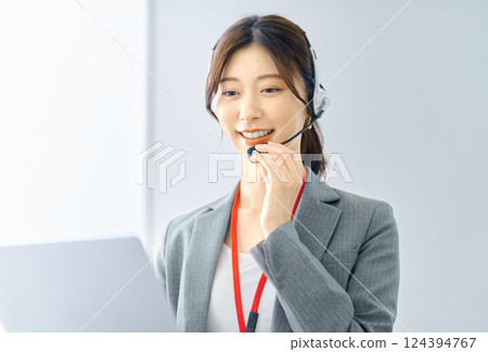 Female operator wearing an intercom Filming cooperation: SKY Perfect Tokyo Media Center 124394767