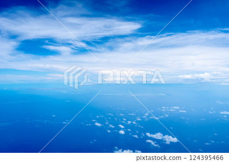 Aerial view of the Tuamotus atoll in French Polynesia with clouds 124395466