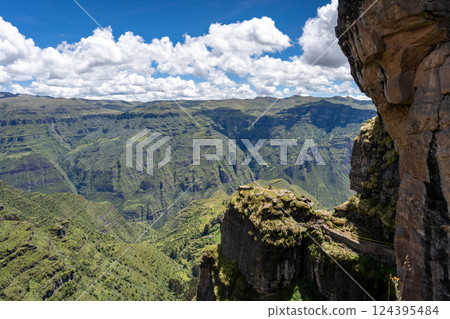Majestic Rocky Mountains Seen from Waqrapukara, a Scenic Inca Site in Peru 124395484
