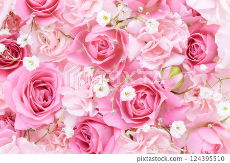 Pink roses and carnations floral background 124395510