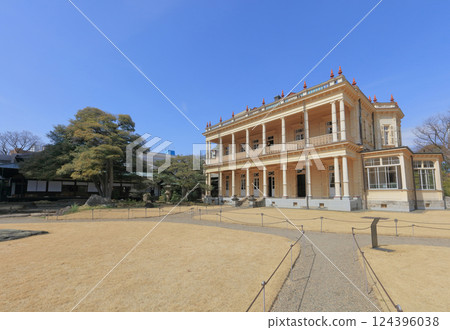 View of the Japanese and Western-style buildings in the Kyu-Iwasaki-tei gardens from the lawn View of the Japanese and Western-style buildings in the Kyu-Iwasaki-tei gardens from the lawn 124396038