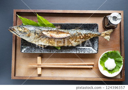 Grilled whole mackerel with salt 124396357