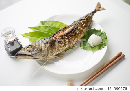 Grilled whole mackerel with salt Grilled whole mackerel with salt 124396376