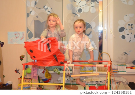 Children climb on a home sports complex 124398191